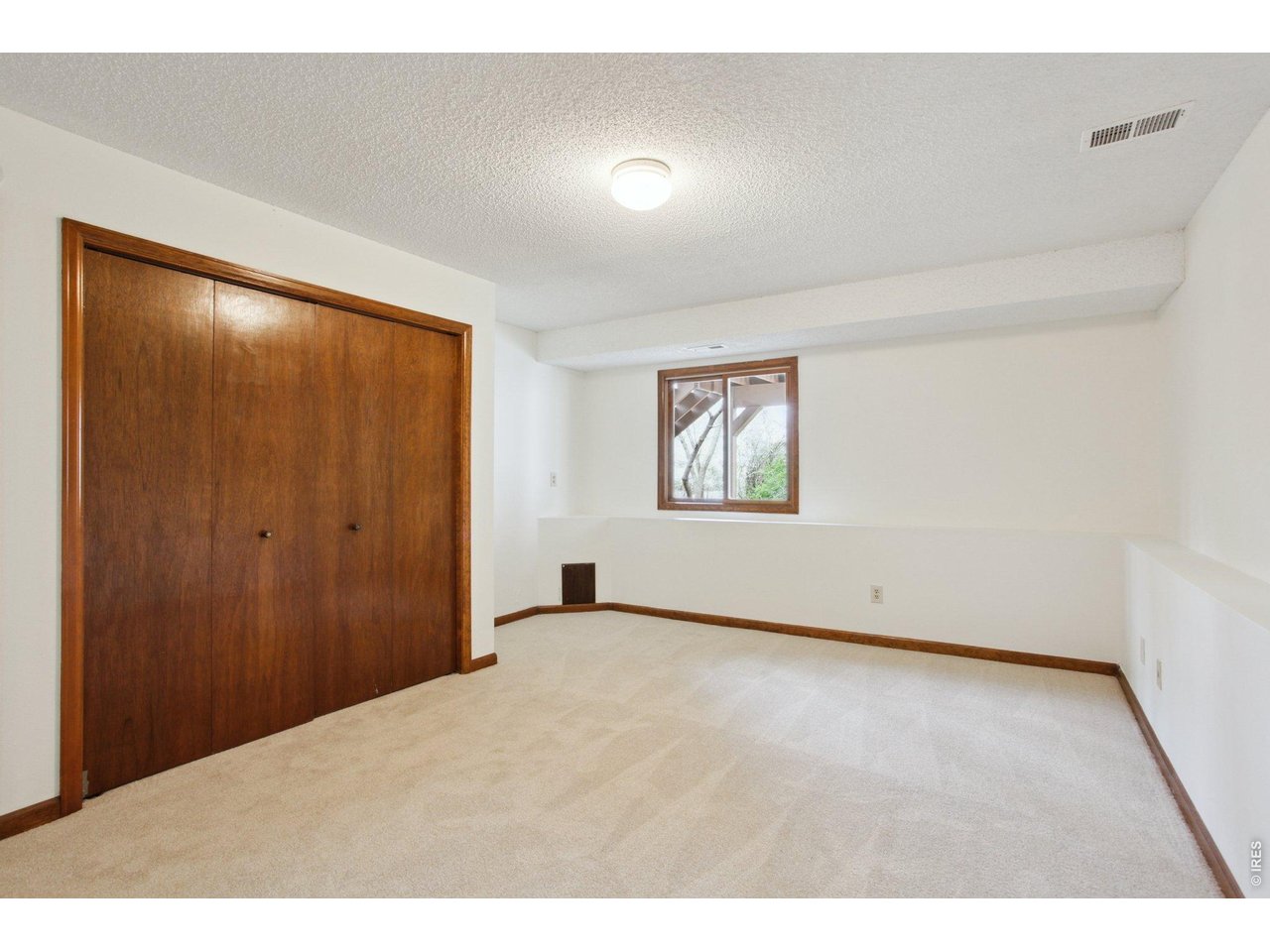 2651 9th Street Boulder, CO 80304 - Photo 20 of 25 a view of an empty room with a window