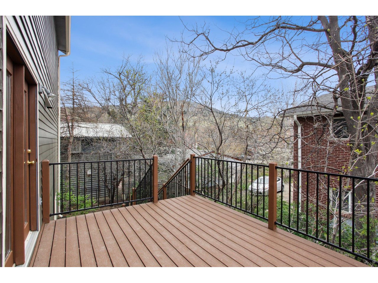 2651 9th Street Boulder, CO 80304 - Photo 24 of 25 a view of balcony with wooden floor and fence