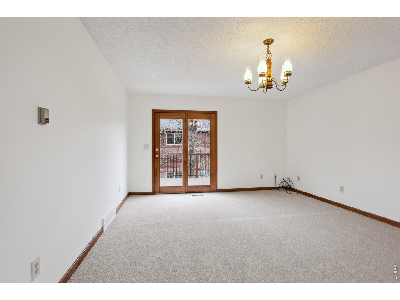 2651 9th Street Boulder, CO 80304 - Photo 8 of 25 a view of an empty room with a window