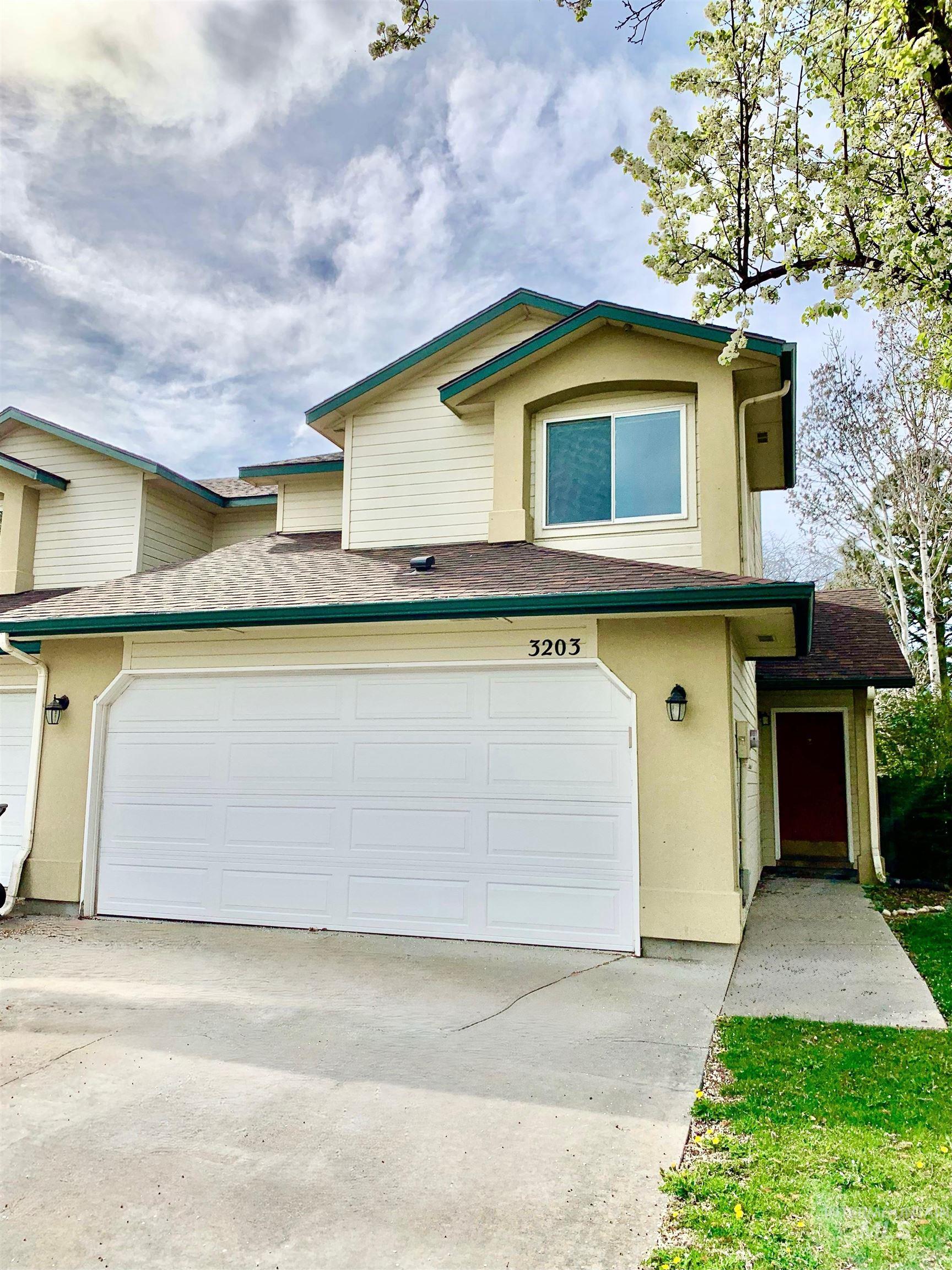 3203 South Capistrano Avenue Boise, ID 83705 - Photo 1 of 30 Traditional home featuring a shingled roof, driveway, and stucco siding