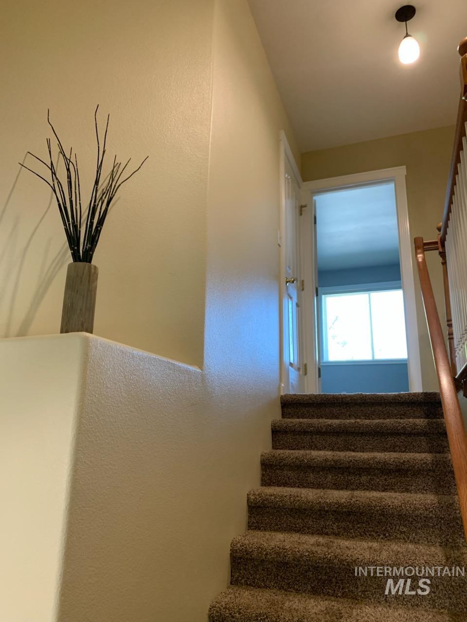 3203 South Capistrano Avenue Boise, ID 83705 - Photo 18 of 30 Stairway with a textured wall