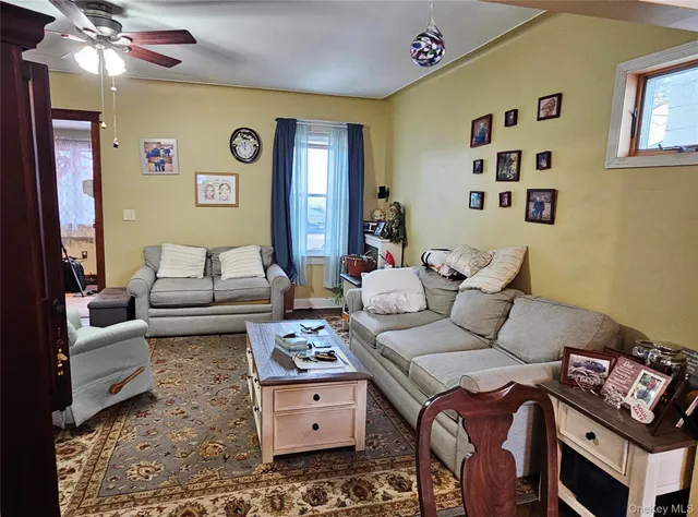 a view of a kitchen with a sink and cabinets