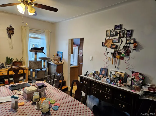 a bathroom with sink shower and mirror