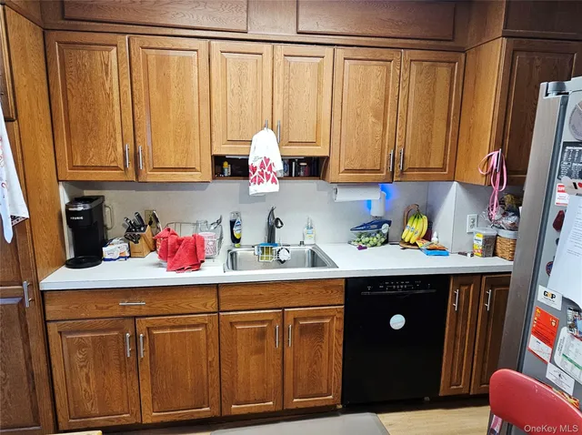 a view of a patio with a table and chairs