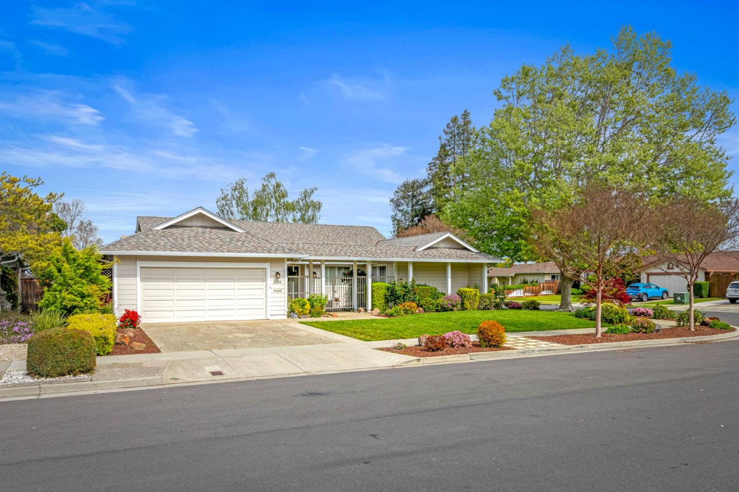 2356 Walden Square San Jose, CA 95124 - Photo 2 of 51 a front view of a house with a yard and trees