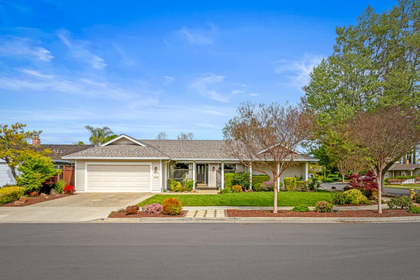 2356 Walden Square San Jose, CA 95124 - Photo 3 of 51 a front view of a house with a garden and plants
