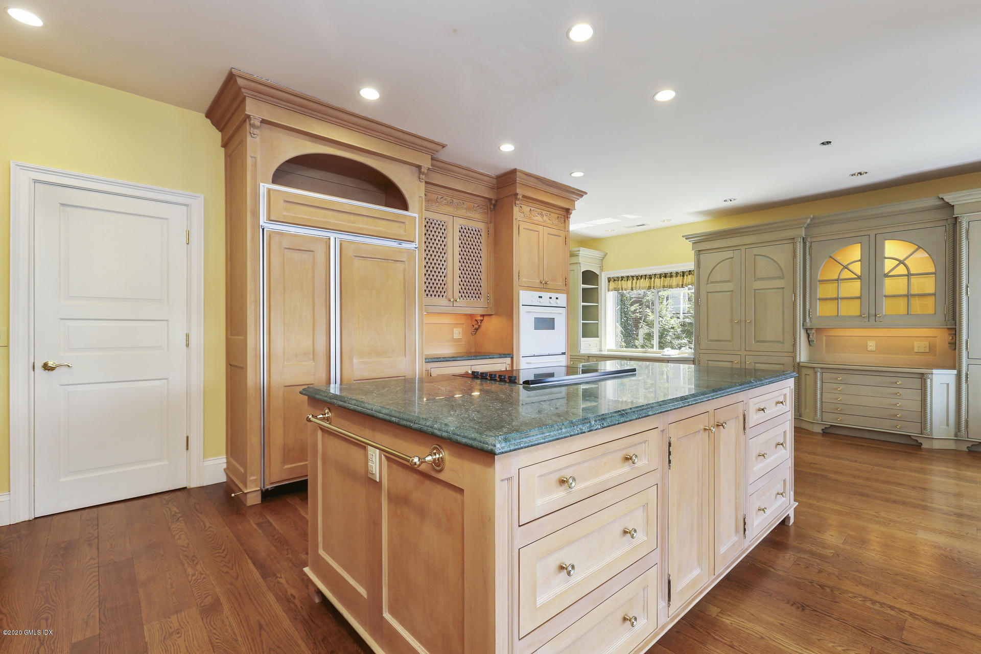 680 Steamboat Road, Unit 6 Greenwich, CT 06830 - Photo 11 of 40 a bathroom with a granite countertop sink and a mirror