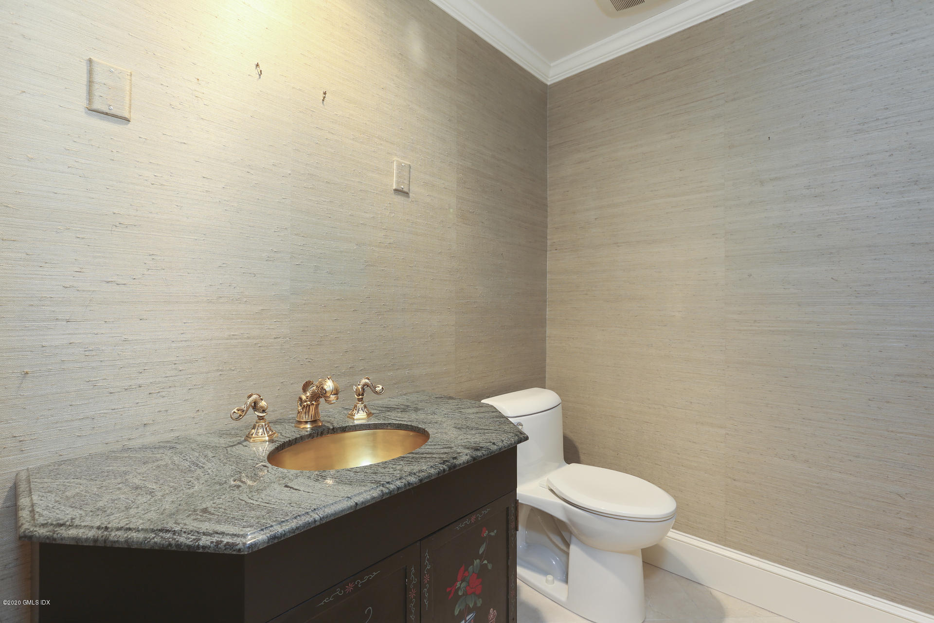 680 Steamboat Road, Unit 6 Greenwich, CT 06830 - Photo 20 of 40 a bathroom with a granite countertop sink and a toilet