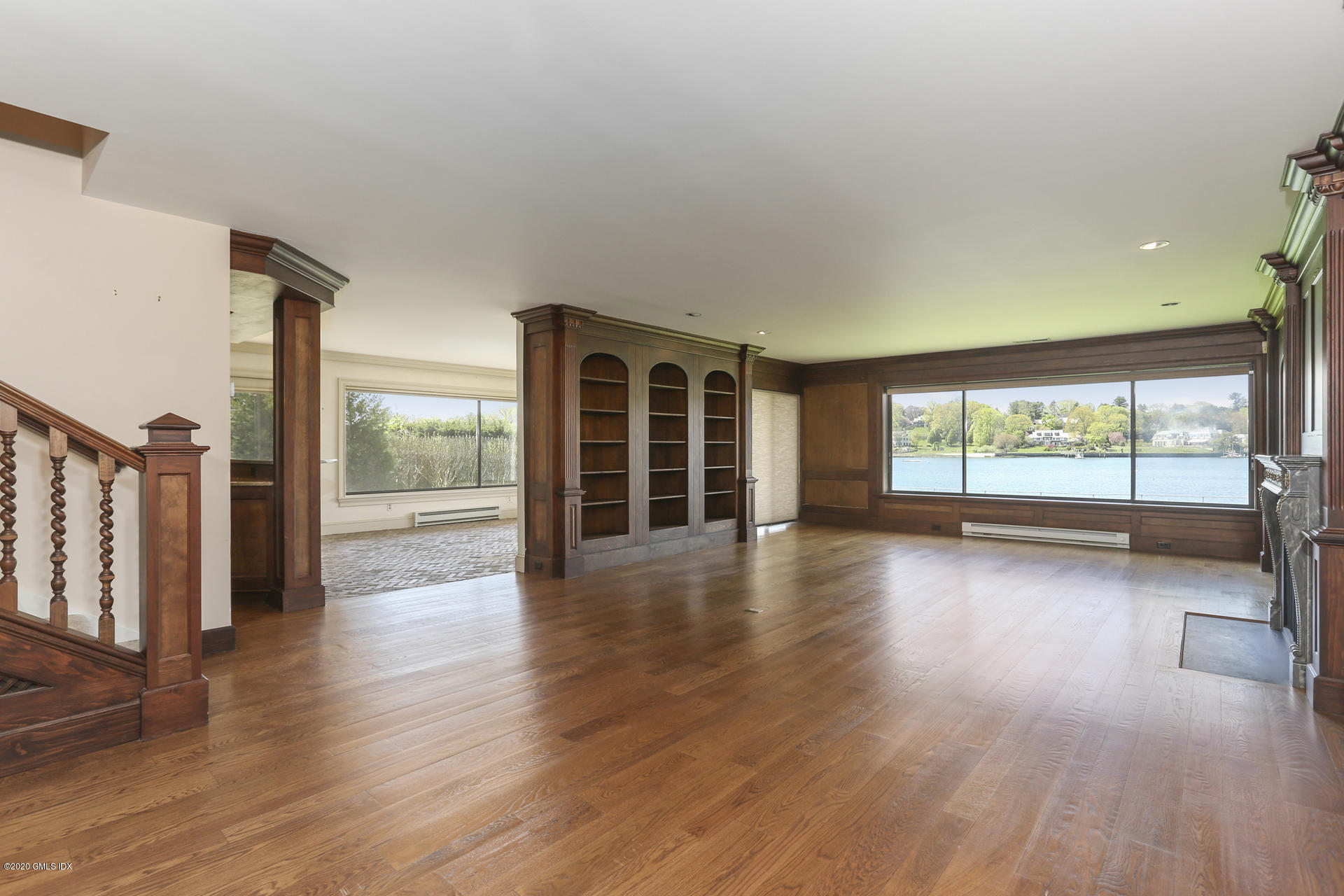 680 Steamboat Road, Unit 6 Greenwich, CT 06830 - Photo 22 of 40 wooden floor in an empty room with a window