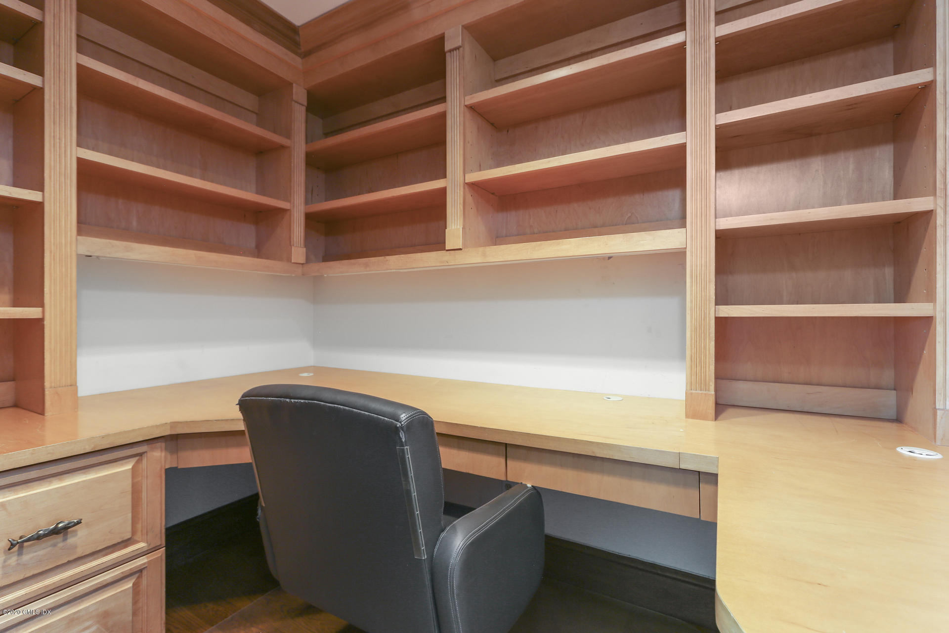 680 Steamboat Road, Unit 6 Greenwich, CT 06830 - Photo 24 of 40 a view of storage and utility room with empty racks