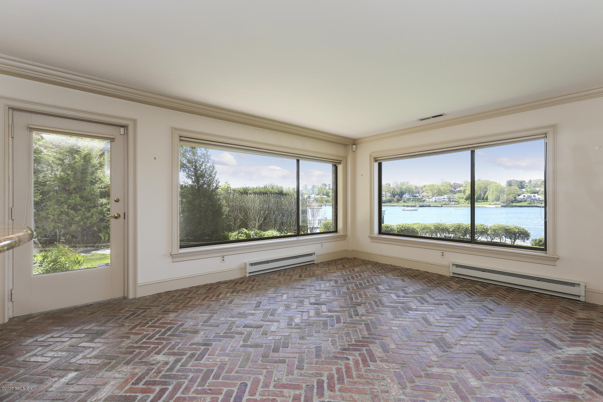 680 Steamboat Road, Unit 6 Greenwich, CT 06830 - Photo 25 of 40 a view of empty room with window