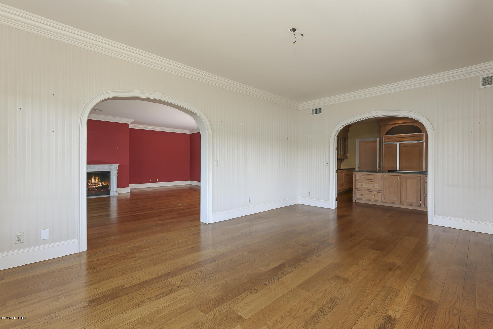 680 Steamboat Road, Unit 6 Greenwich, CT 06830 - Photo 9 of 40 a view of empty room with wooden floor