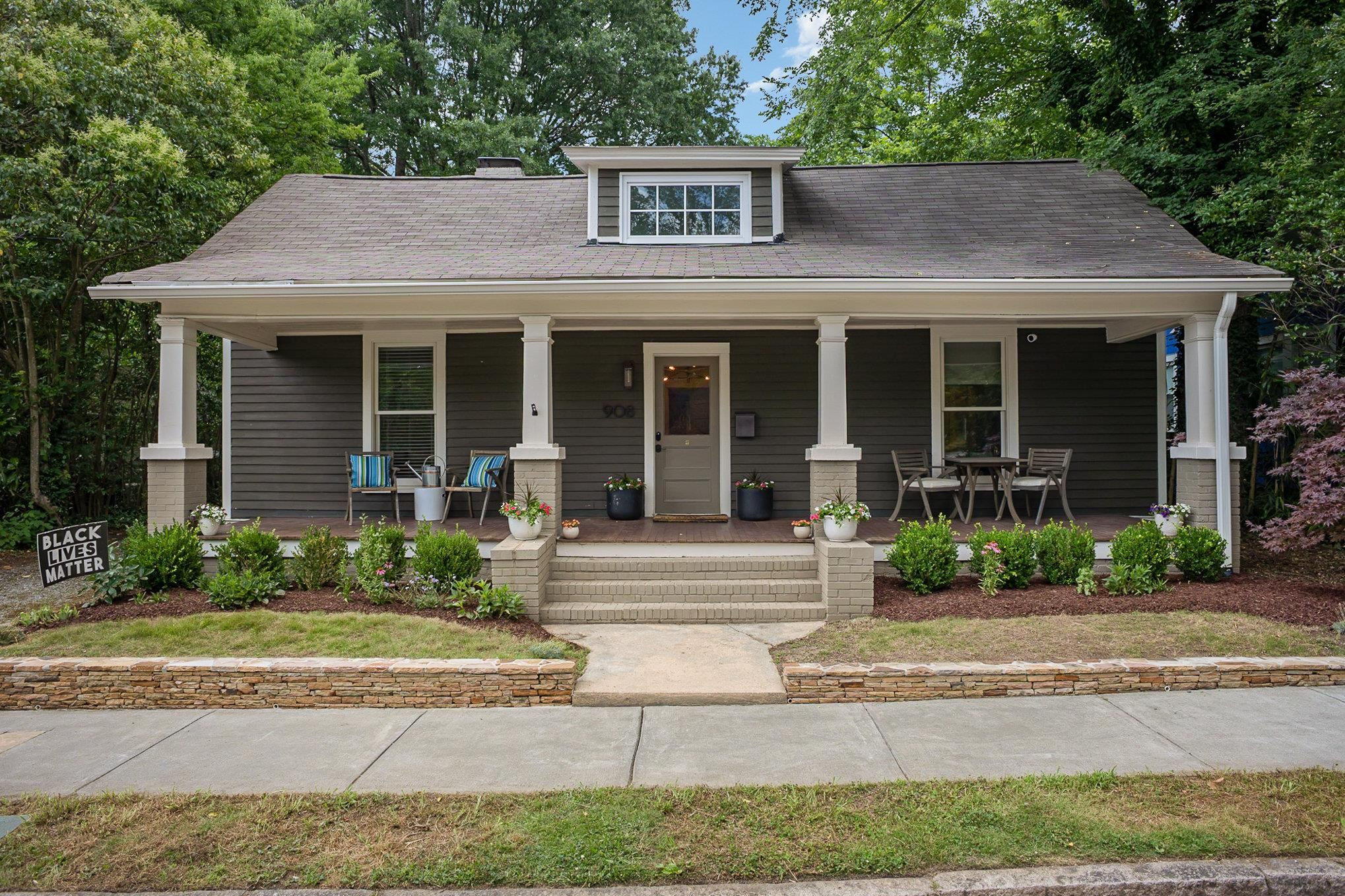front view of a house with a yard