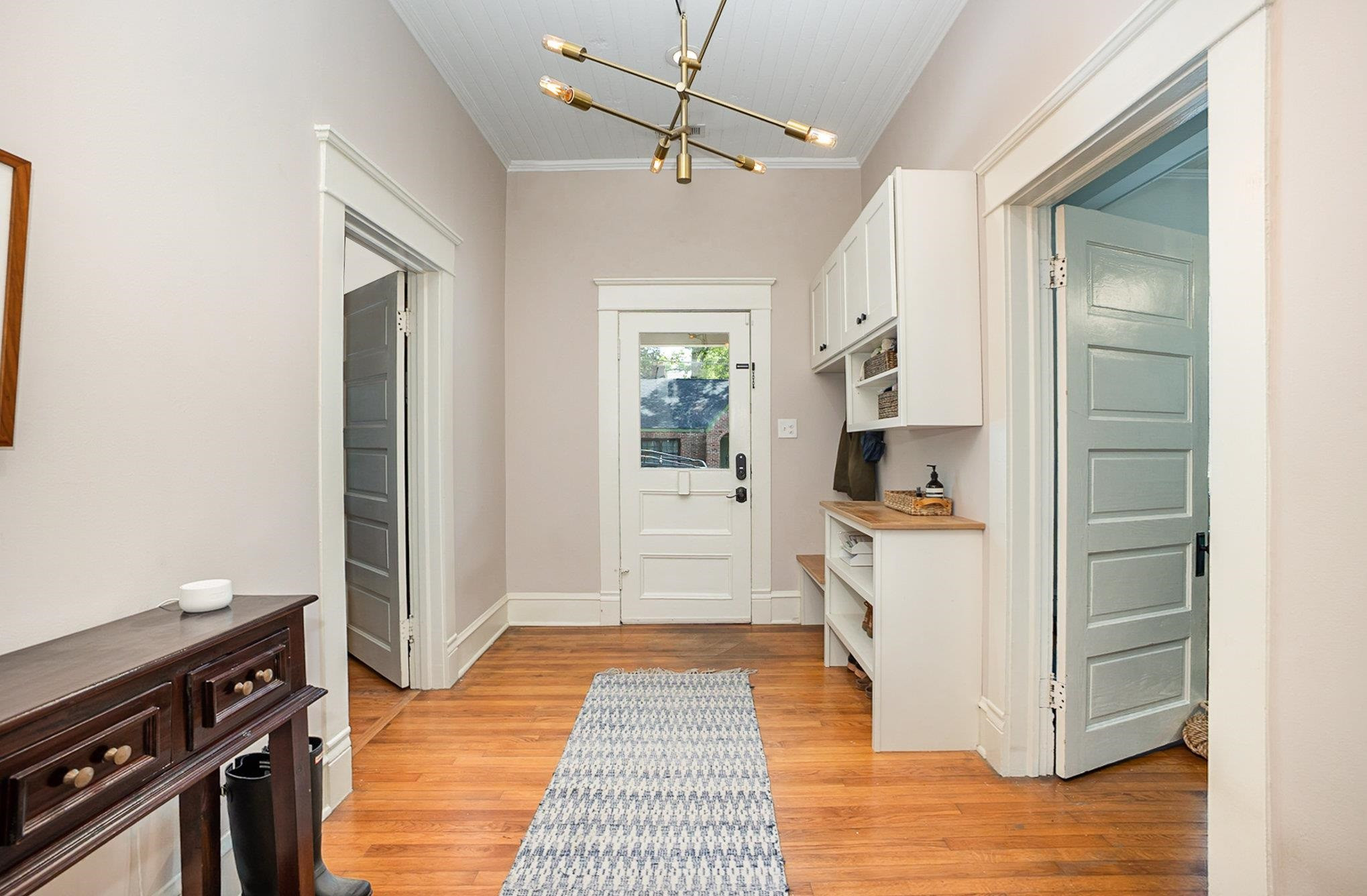 908 Burch Avenue Durham, NC 27701 - Photo 4 of 27 a view of a kitchen from the hallway