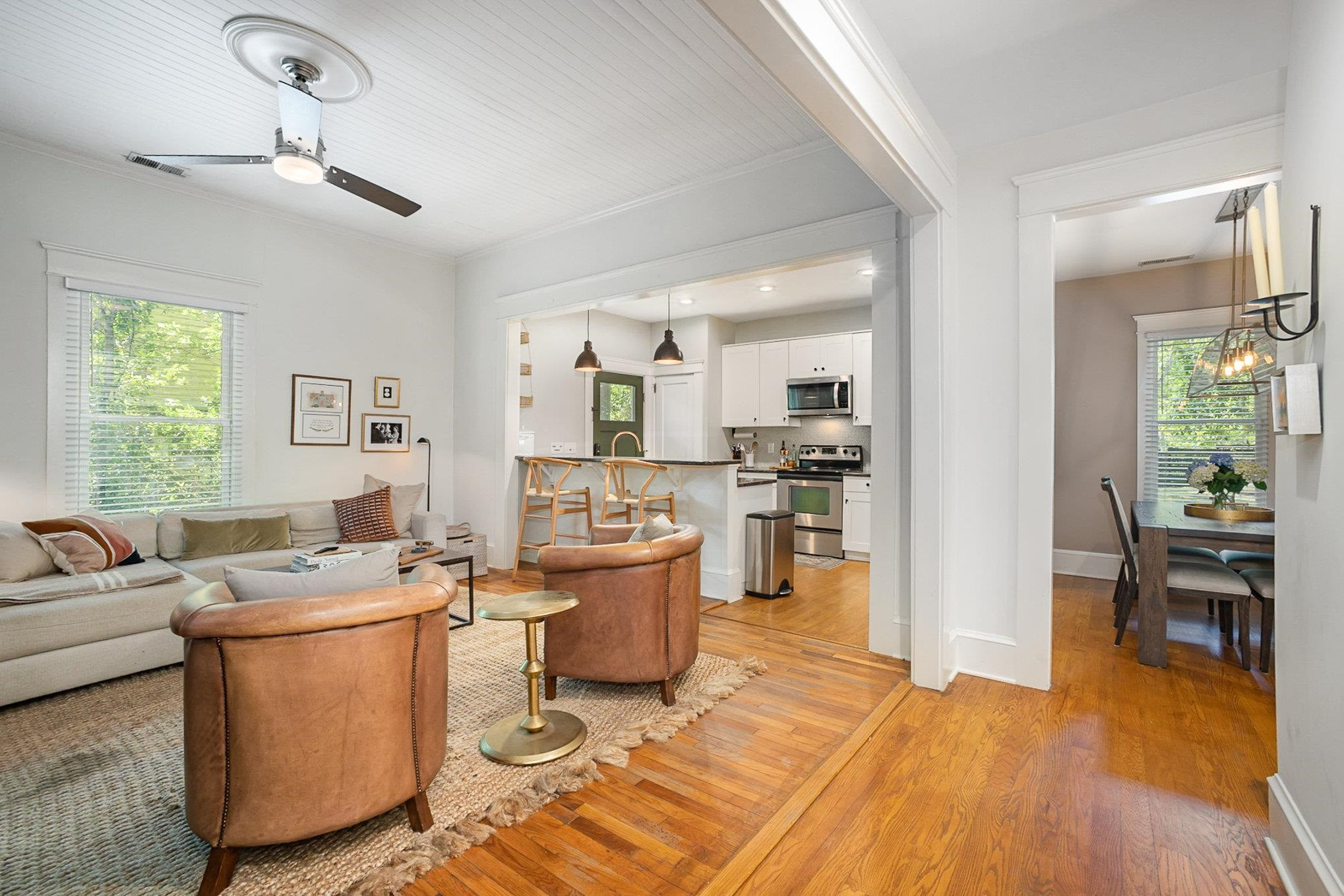 908 Burch Avenue Durham, NC 27701 - Photo 6 of 27 a living room with furniture and kitchen view