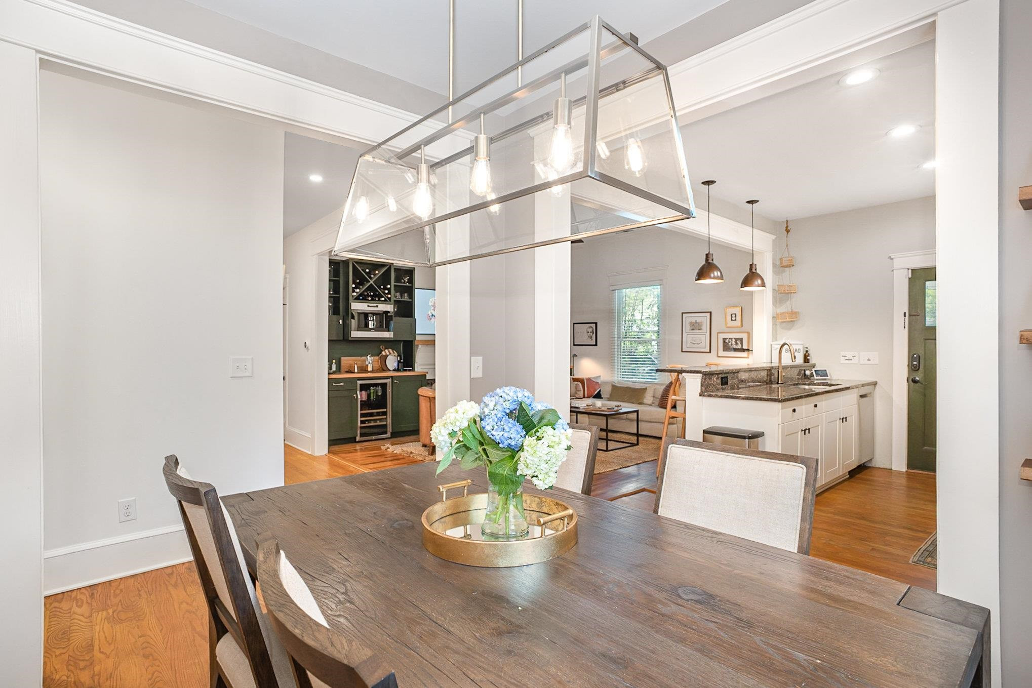 908 Burch Avenue Durham, NC 27701 - Photo 9 of 27 a dining room with furniture and wooden floor