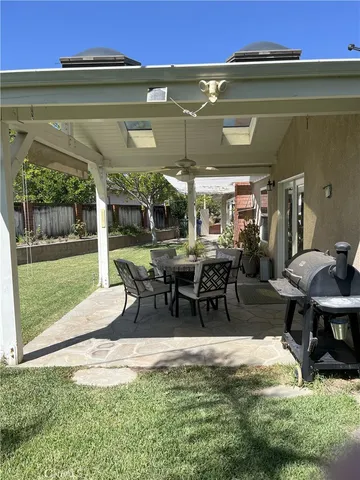 a view of outdoor space with seating area and furniture