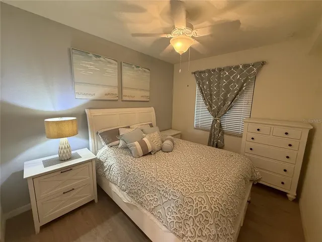 an aerial view of a house with a yard swimming pool outdoor seating and yard