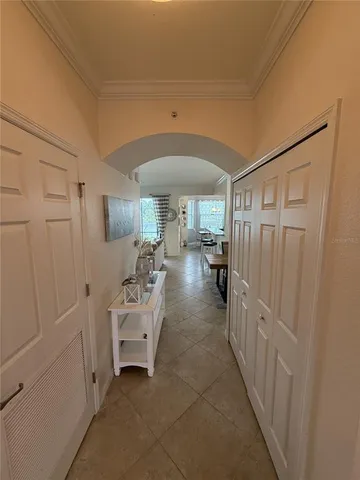 a dining room with a table and chairs