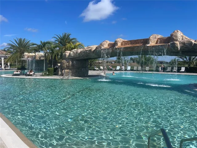 a view of a city with a lake