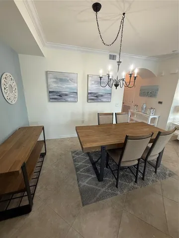 a bathroom with a granite countertop sink a toilet and a mirror