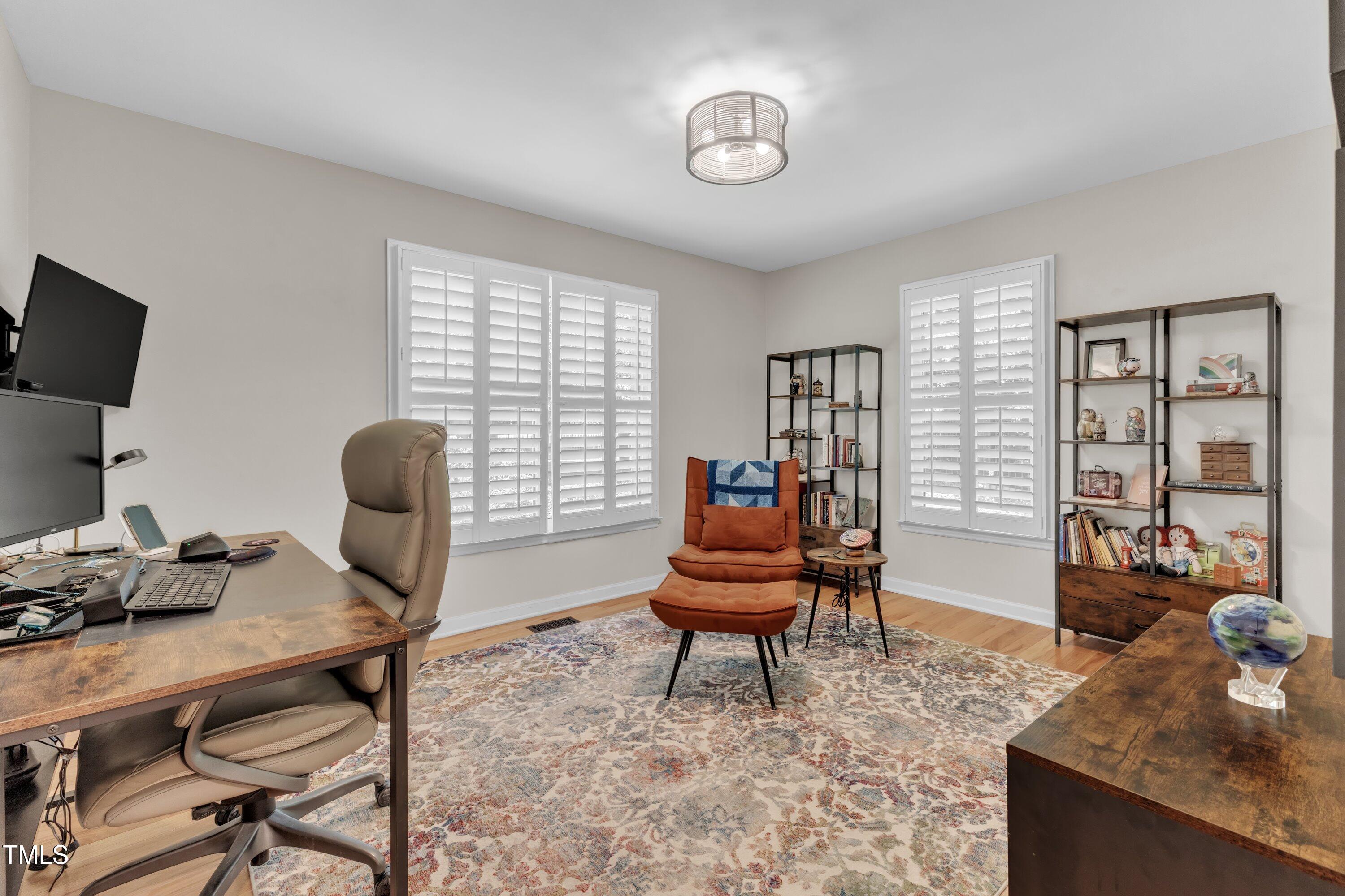 11100 Honeycutt Road Raleigh, NC 27614 - Photo 21 of 37 a living room with furniture and a window