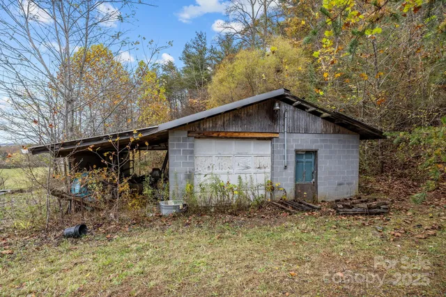 a house with a tree in the background