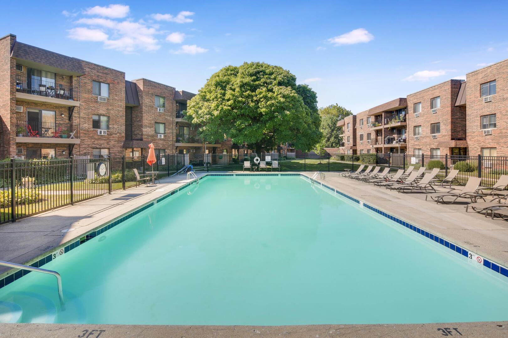 3531 East Central Road, Unit 101 Des Plaines, IL 60025 - Photo 13 of 15 a view of a swimming pool with outdoor seating