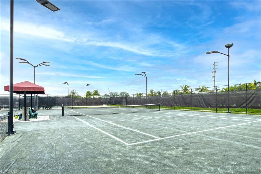 2115 Antigua Lane Naples, FL 34120 - Photo 38 of 41 View of tennis court with community basketball court