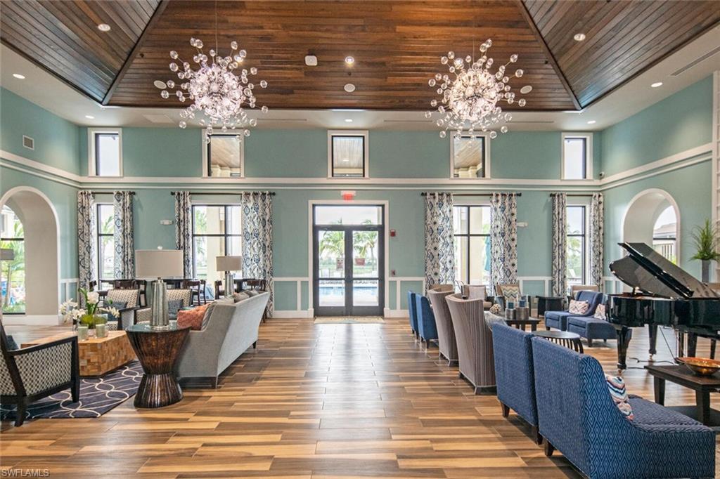 2115 Antigua Lane Naples, FL 34120 - Photo 39 of 41 Common area with wood ceiling, a high ceiling, and recessed lighting