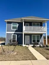 a view of a house with patio