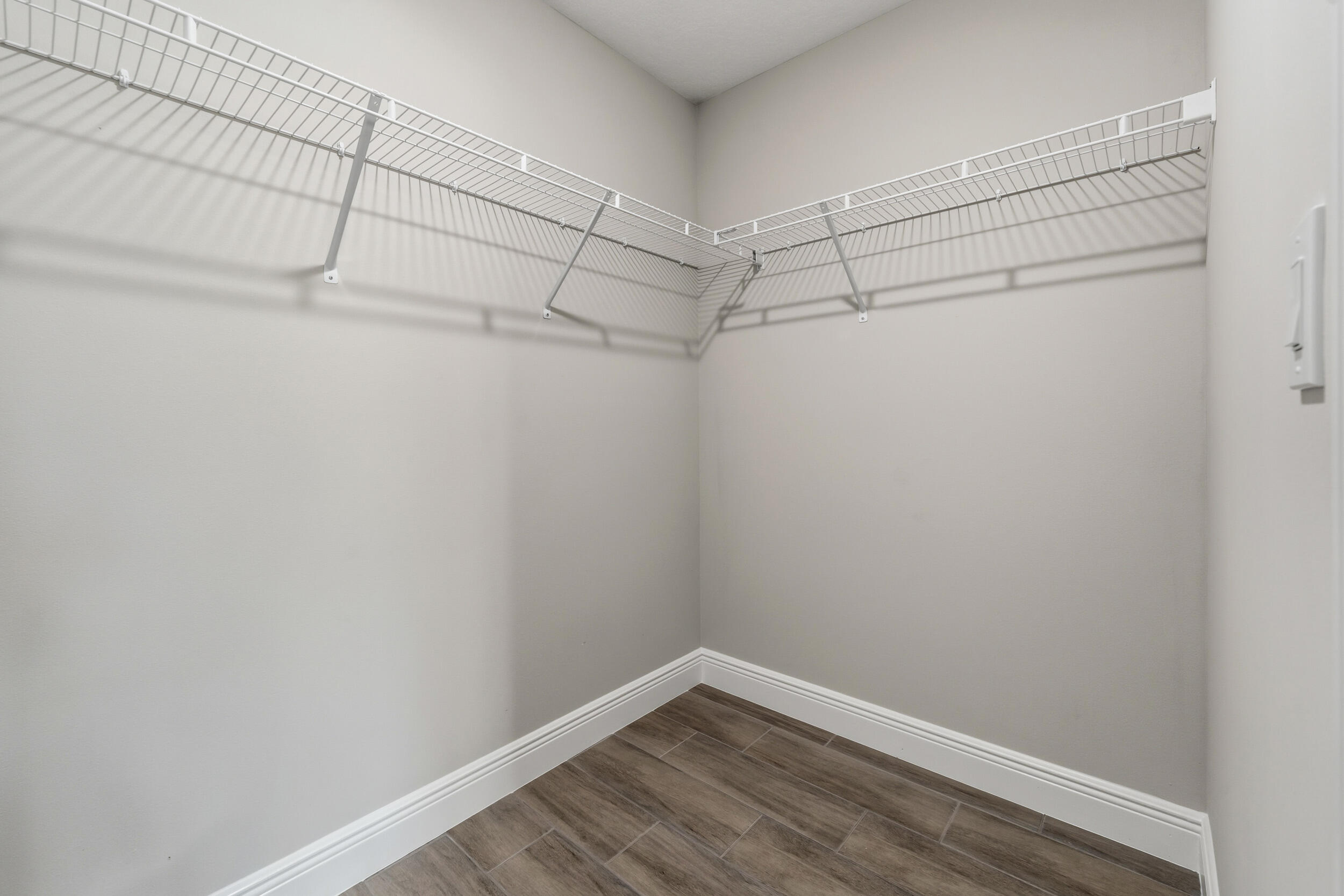4335 Southwest 15th Way Okeechobee, FL 34974 - Photo 20 of 33 a view of a room with racks on the wall