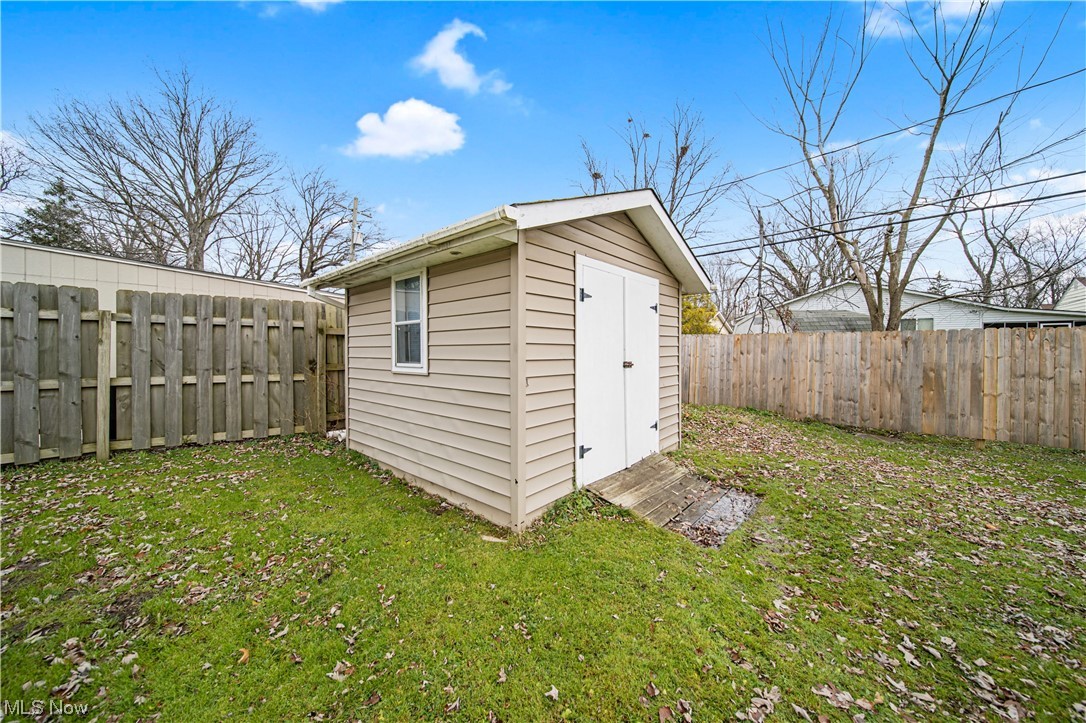 4887 Orchard Road Mentor, OH 44060 - Photo 9 of 26 View of outdoor structure featuring a yard