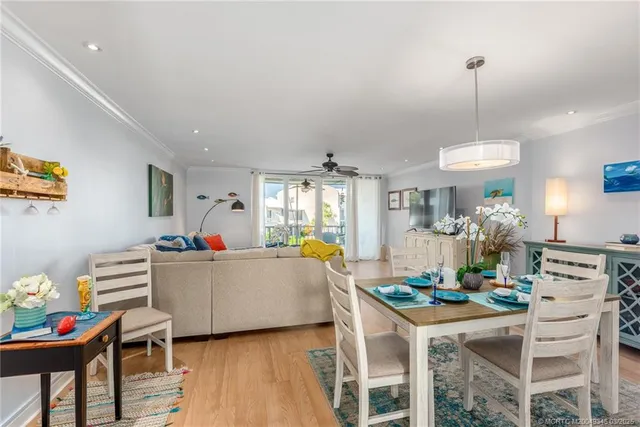 a kitchen with a sink appliances and cabinets