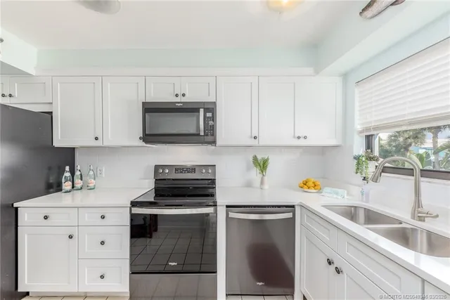 a front view of a house with a glass door