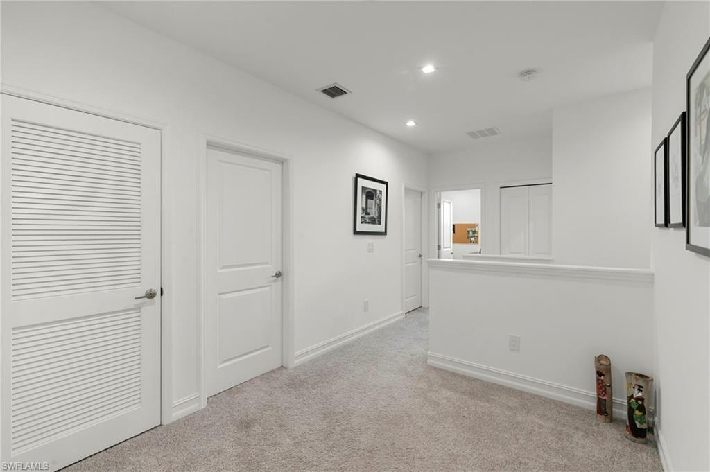 7515 Morgan Way Naples, FL 34119 - Photo 20 of 34 a view of a livingroom with an empty space