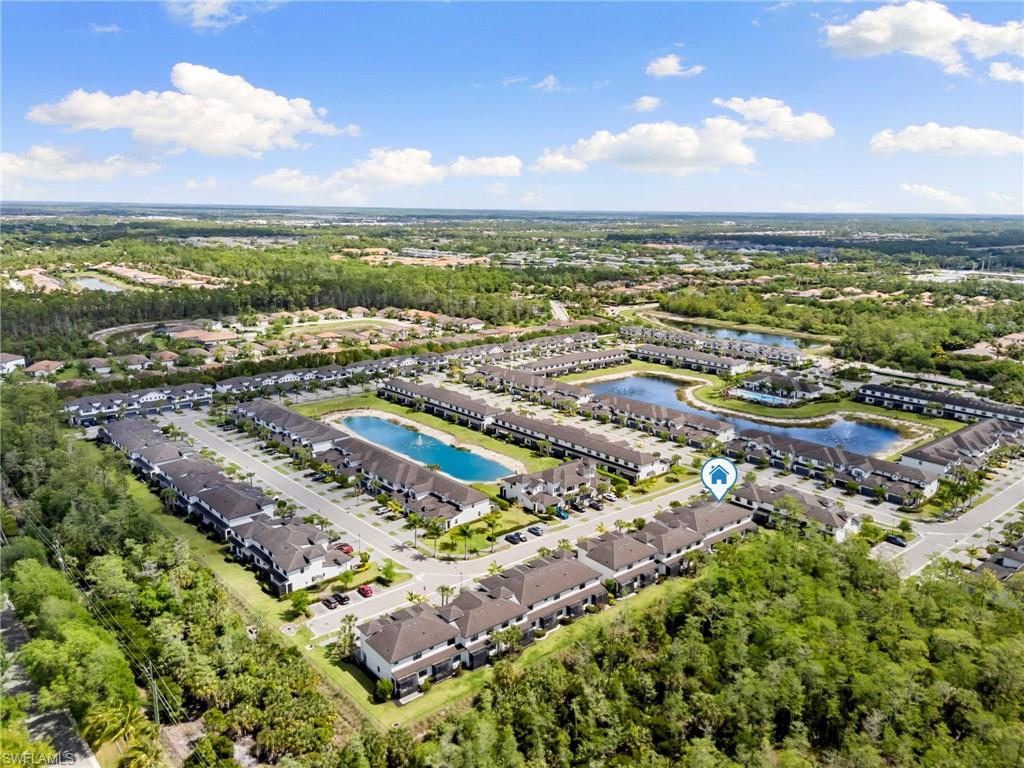 7515 Morgan Way Naples, FL 34119 - Photo 26 of 34 a view of a city with an ocean