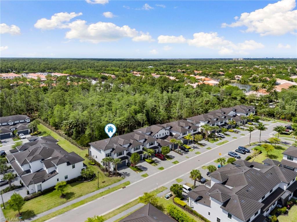 7515 Morgan Way Naples, FL 34119 - Photo 27 of 34 an aerial view of multiple house