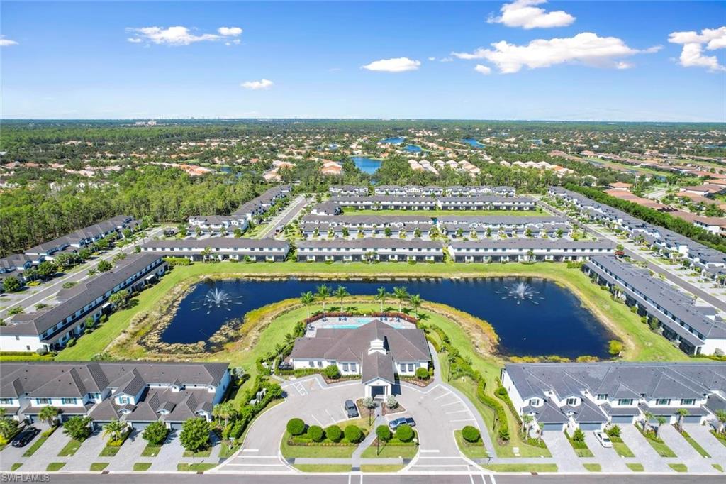 7515 Morgan Way Naples, FL 34119 - Photo 33 of 34 an aerial view of a swimming pool and outdoor space