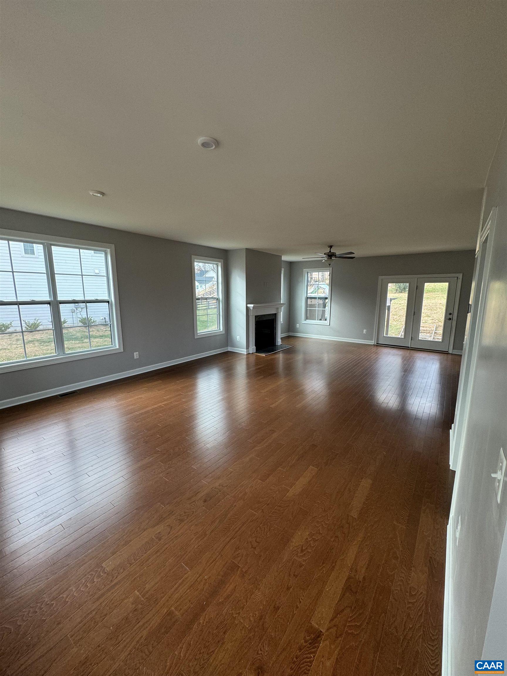 104 Paynes Mill Road Charlottesville, VA 22902 - Photo 4 of 47 a view of livingroom and hall with wooden floor
