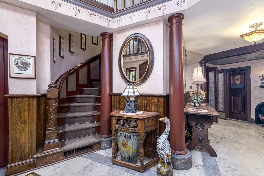 2550 Vineyard Road North Kingstown, RI 02874 - Photo 11 of 50 Front foyer with stairs to atrium with indoor pool and ahead to kitchen