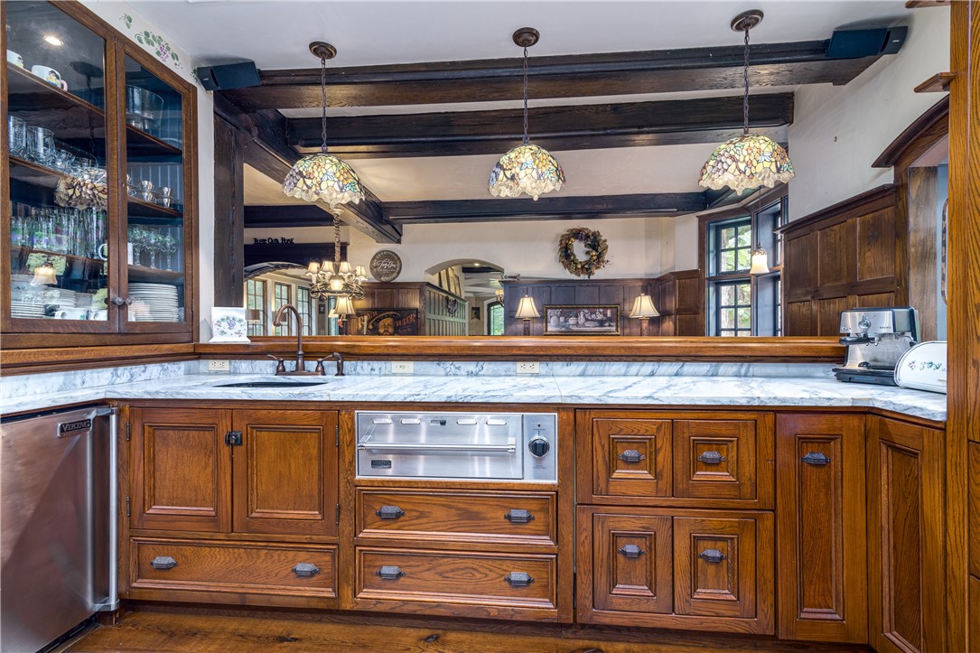 2550 Vineyard Road North Kingstown, RI 02874 - Photo 14 of 50 Kitchen open to gathering room, there is a bar counter with seating for 5 and a bar refrigerator