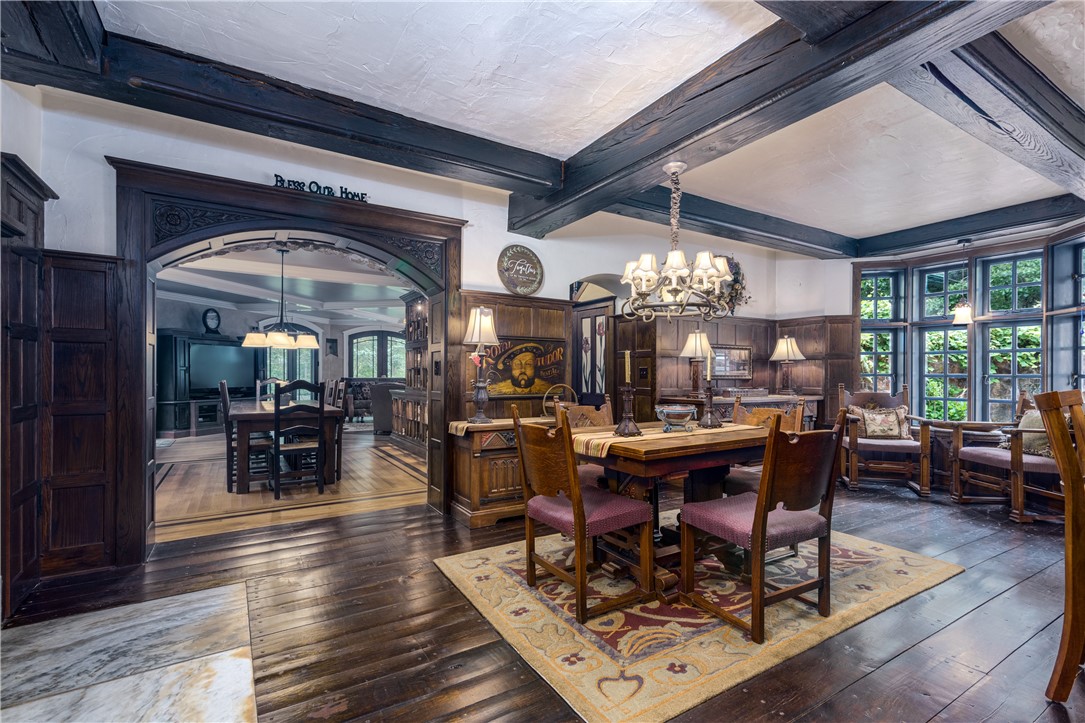 2550 Vineyard Road North Kingstown, RI 02874 - Photo 16 of 50 Gathering room opens to dining room Wide plank pine floor were harvested from the property when built There is also radiant heat in the floors