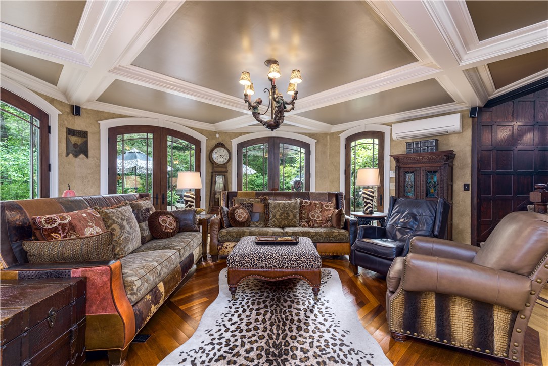 2550 Vineyard Road North Kingstown, RI 02874 - Photo 18 of 50 Coiffured ceilings, Africian oak floors make this Octagon living room the gathering place! 5 glass doors lead out to the spacious entertaining patio