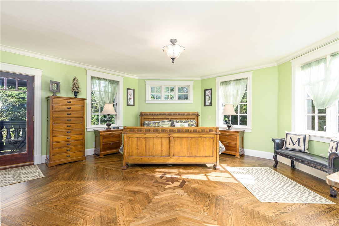 2550 Vineyard Road North Kingstown, RI 02874 - Photo 21 of 50 Main master bedroom offer herringbone hardwood floors and balcony overlooking fields