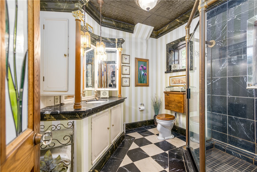 2550 Vineyard Road North Kingstown, RI 02874 - Photo 27 of 50 Bathroom with marble floors and shower. Vanity was reclaimed from a Newport estate