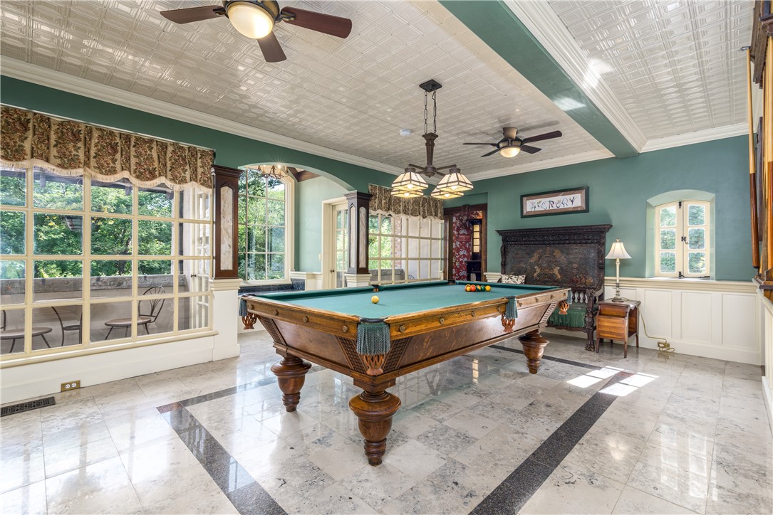 2550 Vineyard Road North Kingstown, RI 02874 - Photo 33 of 50 Pool table room with 2 balconies. overlooking front courtyard. Tin ceiling and wainscoting on walls. Full bath is off this room