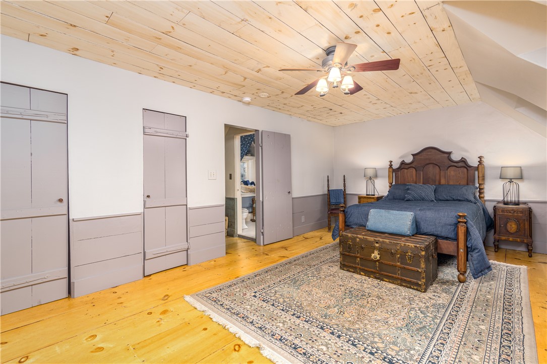 2550 Vineyard Road North Kingstown, RI 02874 - Photo 40 of 50 All bedrooms are ensuite.
This 3rd floor bedroom has vaulted wood ceilings and wide plank floors