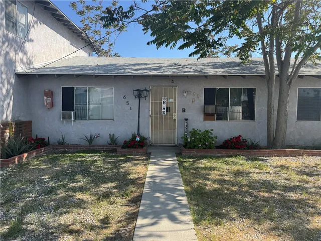 a bathroom with a sink a toilet and a vanity