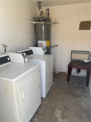 a living room with furniture a air conditioner and a window